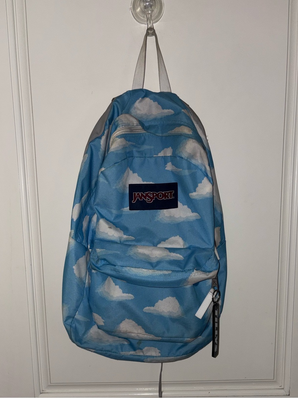 Jansport Blue Backpack with White Cloud Print